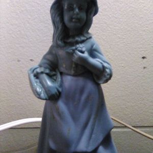 Avon fragrance figurine
